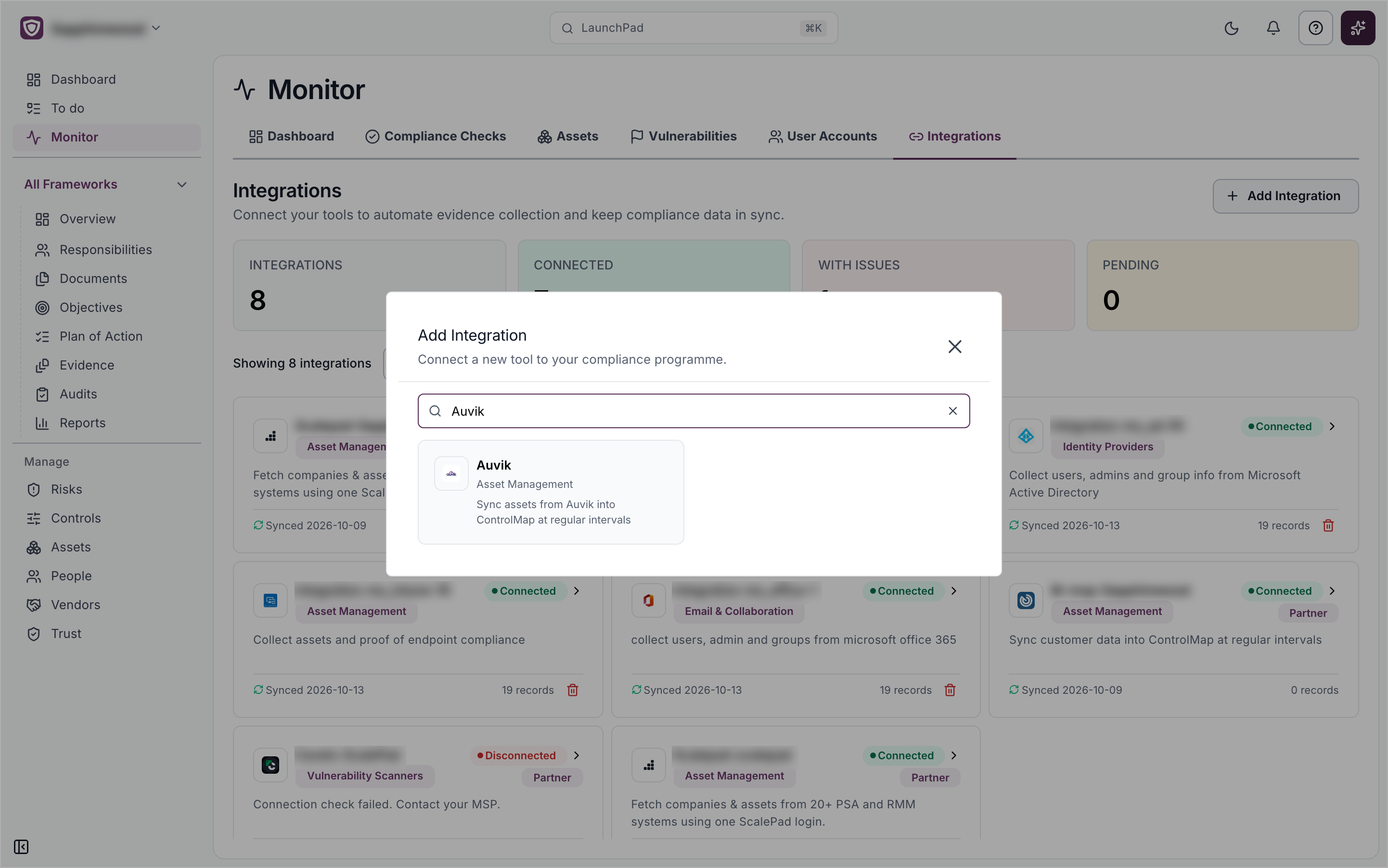 The Add Integration window with Auvik typed in the search box and the Auvik card showing
