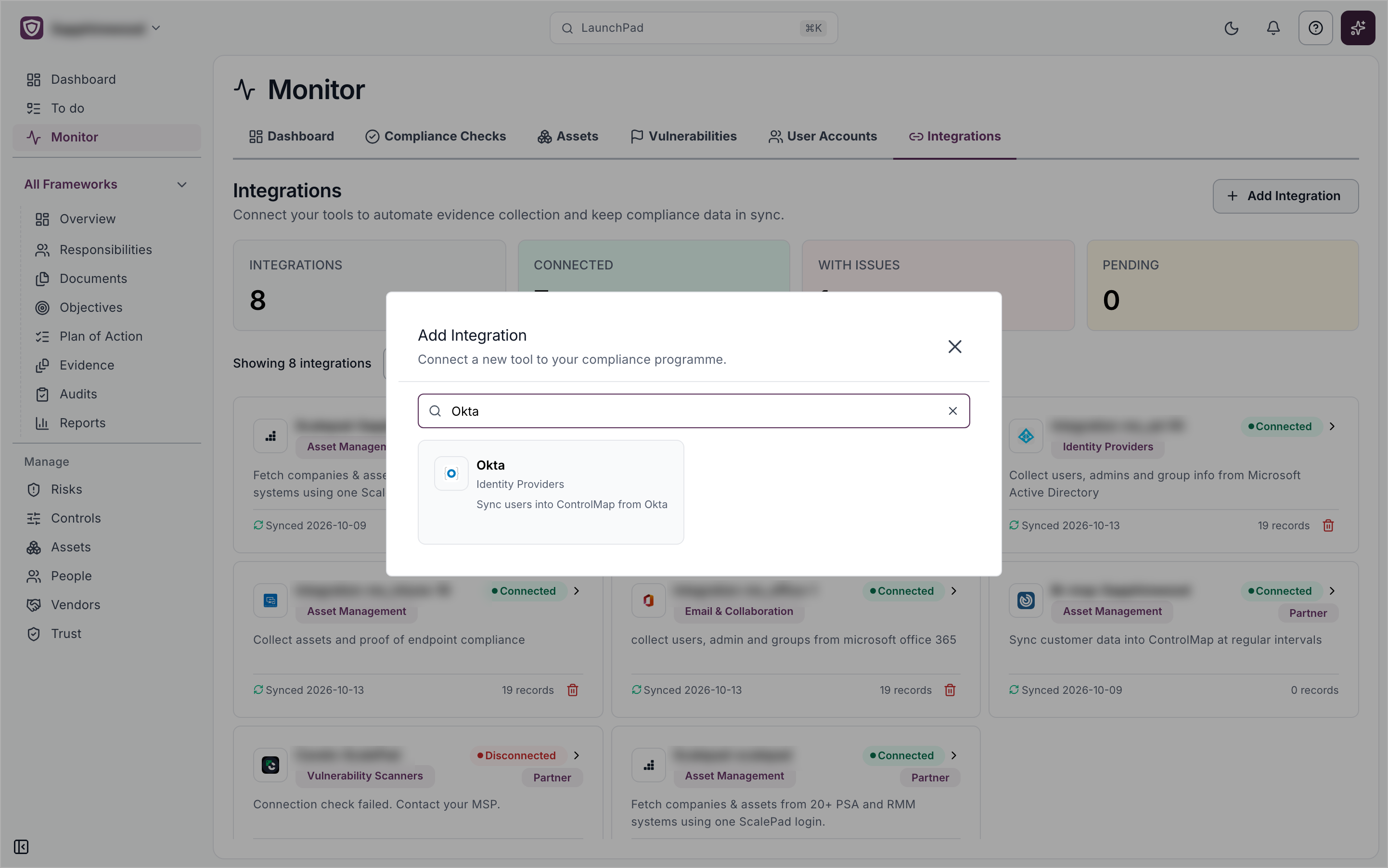 The Add Integration window searched for Okta, showing the Okta card in the Identity Providers category